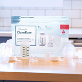 Ameda CleanEase pack surrounded by Ameda breast pump parts on a kitchen bench