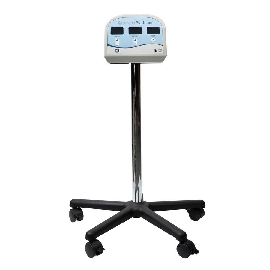 An Ameda Platinum breast pump mounted on the Ameda trolley stand, on a chrome column with a wheeled five-castor base