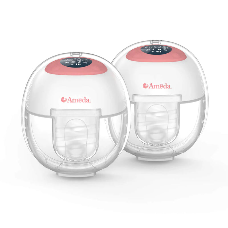 Two Ameda GLO wearable breast pumps side by side, each with a pink control panel and a clear collection cup